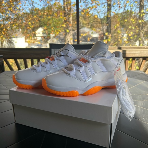 NEW Women’s Air Jordan 11 Retro Low Bright Citrus- US 7 - Picture 1 of 9
